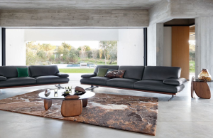 A modern, living room with minimalist neutral coloured design styles.