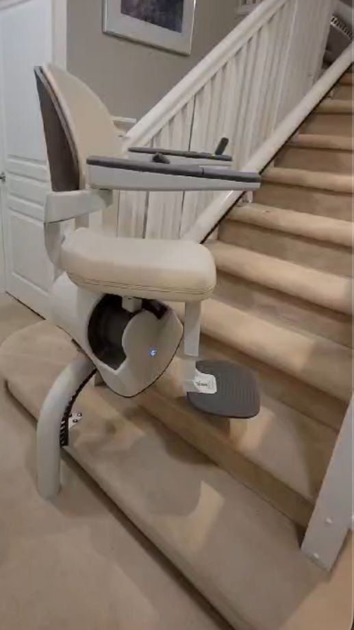 Chair lift for interior stairs allow safe ride to upper floor.